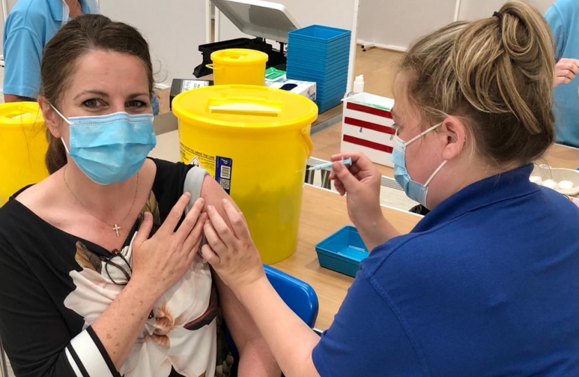 Caroline receiving her second vaccination in June