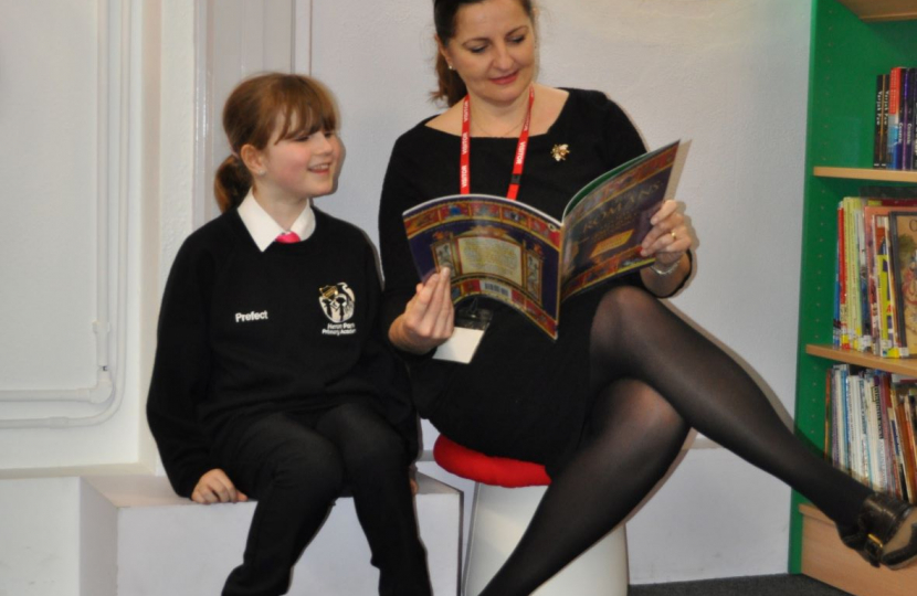 Caroline Reading at the Library